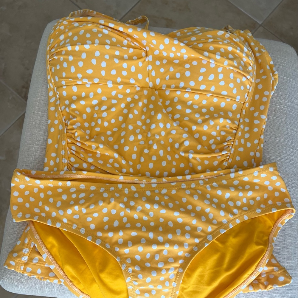 Nip tuck swimsuit tankini.